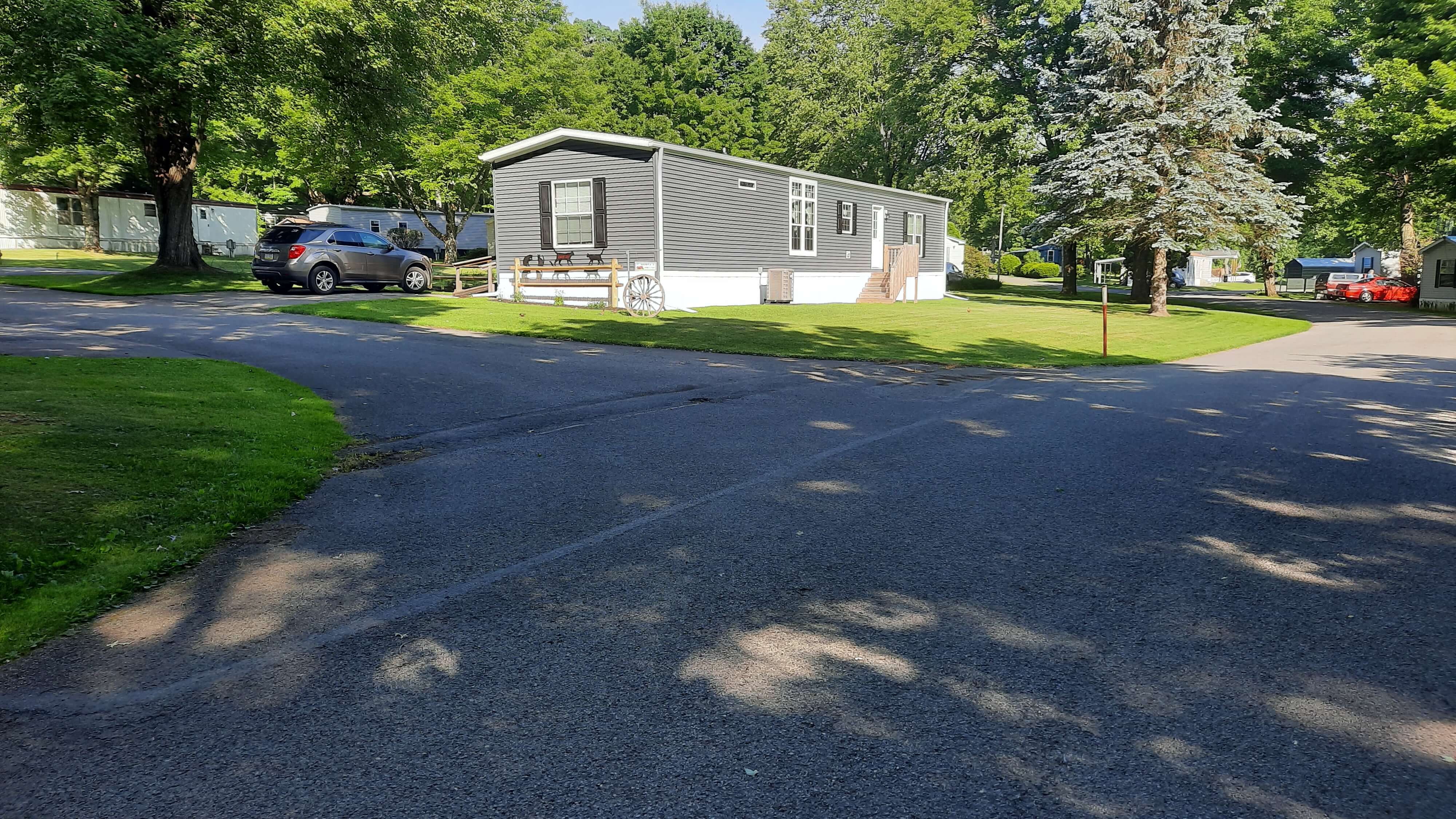 Intersection with yard and mobile home