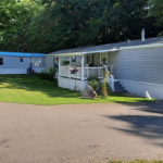 Decorated yard and deck of mobile home icon