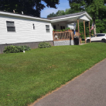 Open yard and porch of mobile home icon