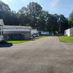 Alernate view of community road with covered parking spaces icon